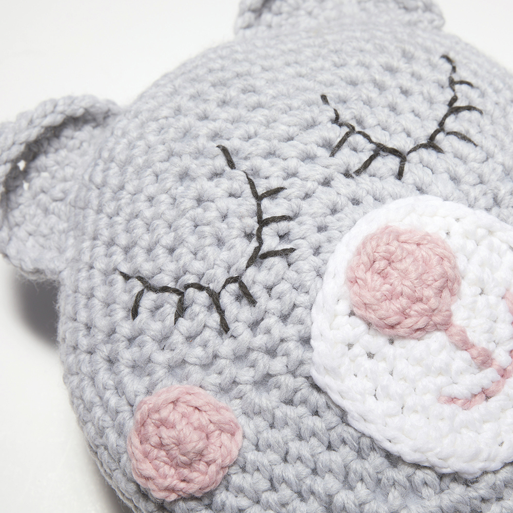 This Sleepy Teddy Pillow is the perfect crossover between a pillow and a stuffed animal. #crochetpillow #crochetcushion #crochetpattern #crochetlove #crochetaddict