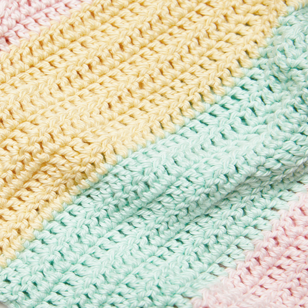 The Pastel Stripes Sweater is so colorful and exciting that any child would love it! #crochetsweater #crochetpattern #crochetlove #crochetaddict