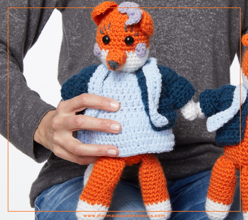 The Mrs Fox Toy is this adorable little fox with rosy cheeks and a little bow on her head. #crochettoy #amigurumi #crochetpattern #crochetlove
