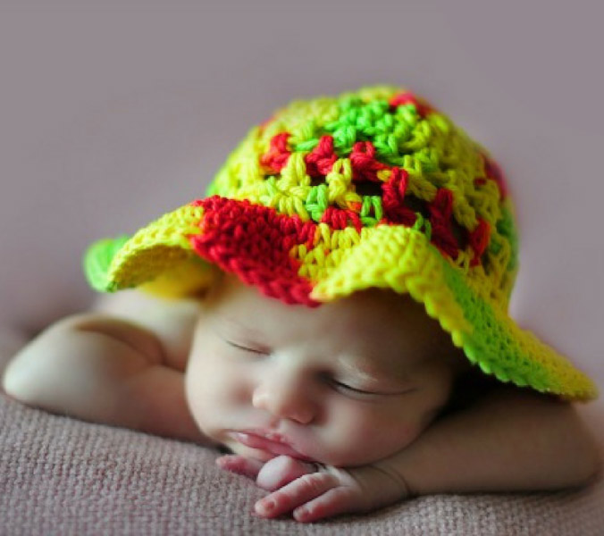 Coraline's Sun Hat - These free newborn crochet hat patterns are fun and easy to work on. These baby accessories are so fast to make and anyone can do it. #CrochetBabyHatPatterns #CrochetHatPatterns #CrochetNewbornHats