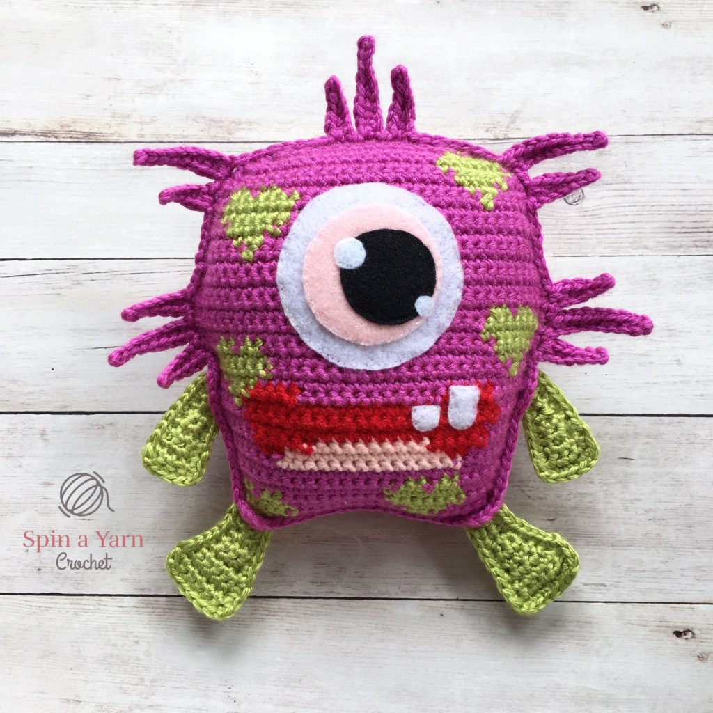 Blinky – Love Monster - One way you can show your love for kids this Valentine’s is by crocheting these simple crochet patterns. #simplecrochetpatterns #crochetpatterns #kidscrochetpatterns