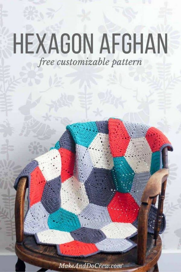 The Happy Hexagons Crochet Afghan on a wooden chair