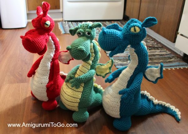 3 different types of crochet dragon in the kitchen
